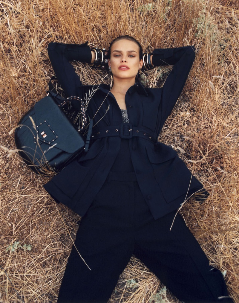 Model Birgit Kos dresses in all black for Roberto Cavalli's spring-summer 2018 campaign