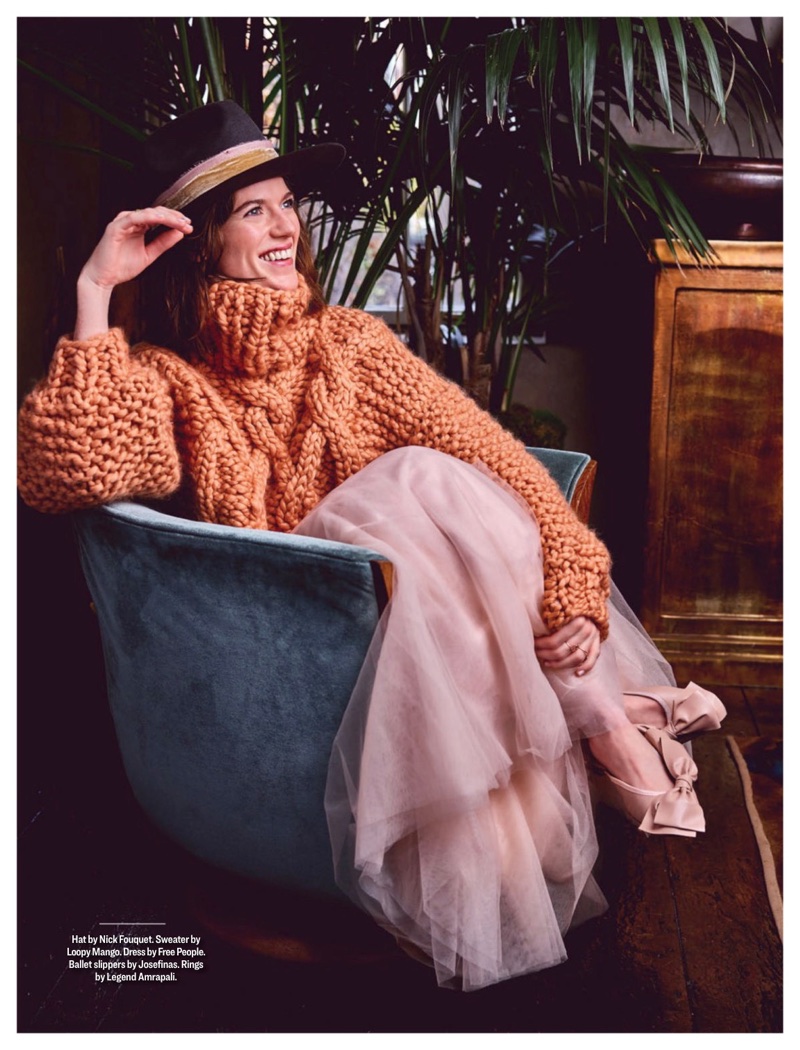 Flashing a smile, Rose Leslie wears Nick Fouquet hat, Loopy Mango sweater, Free People dress and Josefinas ballet slippers