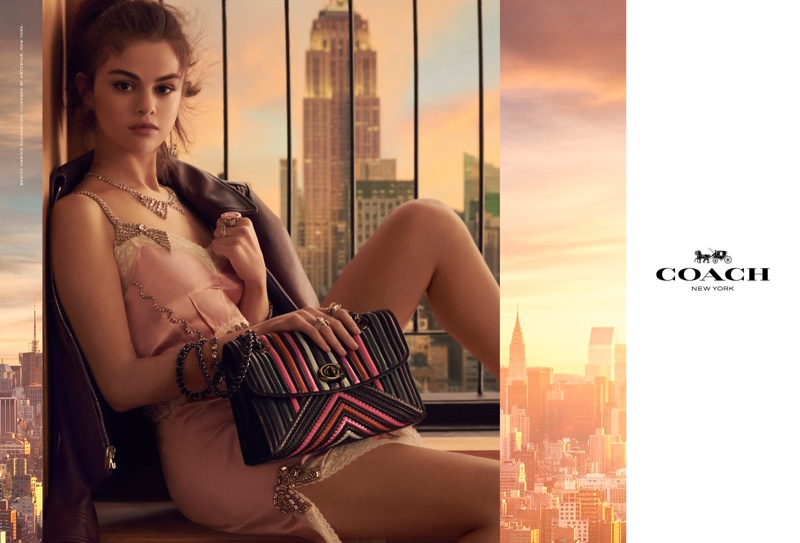 Singer Selena Gomez wears a slip dress in Coach's spring-summer 2018 handbag campaign