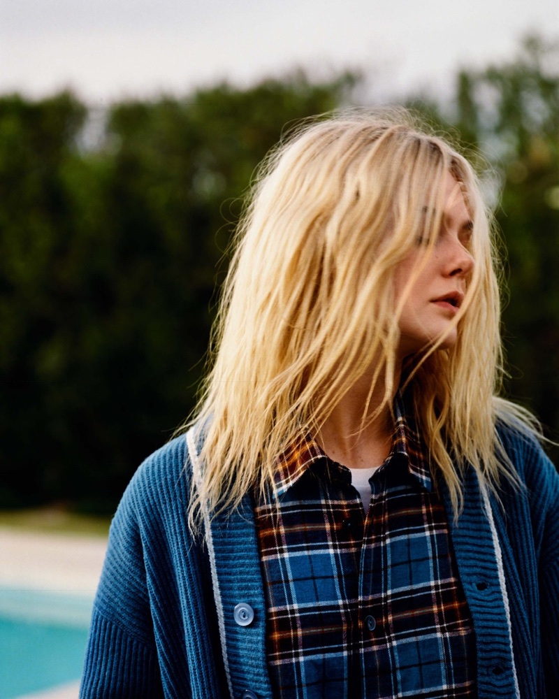 Keeping it casual, Elle Fanning wears plaid shirt and cardigan