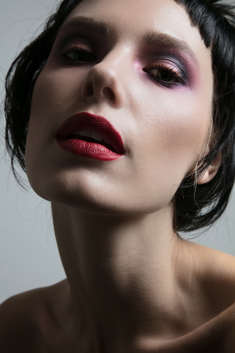 Model Jenny Savers shows off red lipstick shade. Photo: Jeff Tse