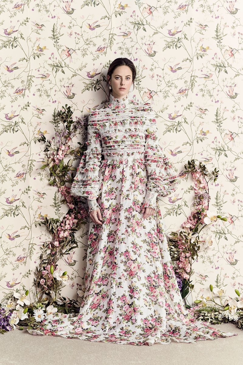 Actress Kaya Scodelario wears a maxi floral print dress