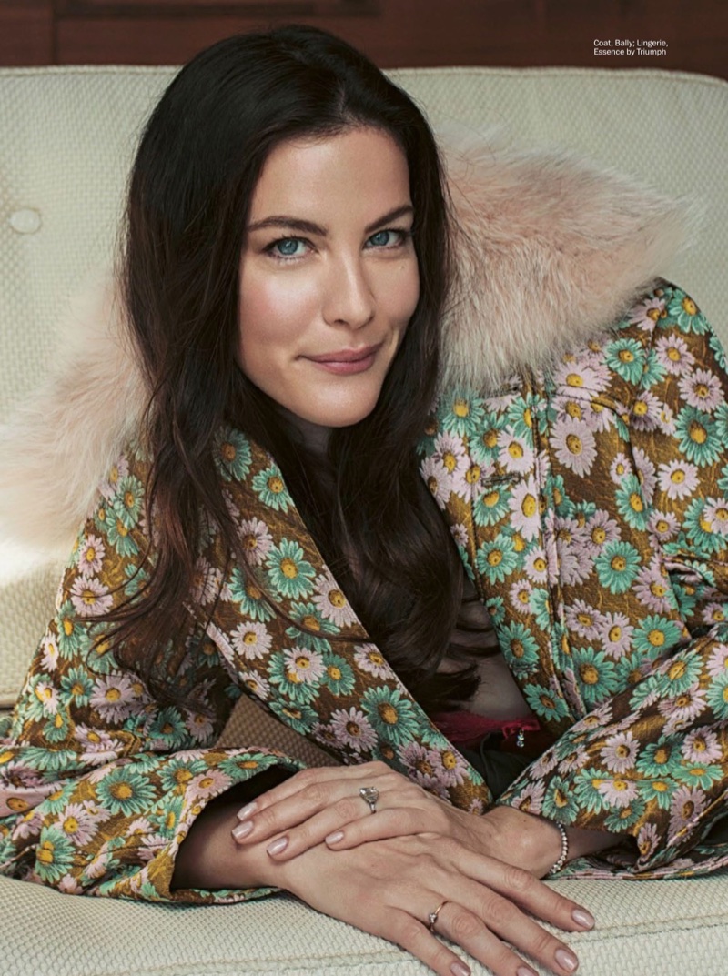 Liv Tyler wears Bally jacket with Triumph bra