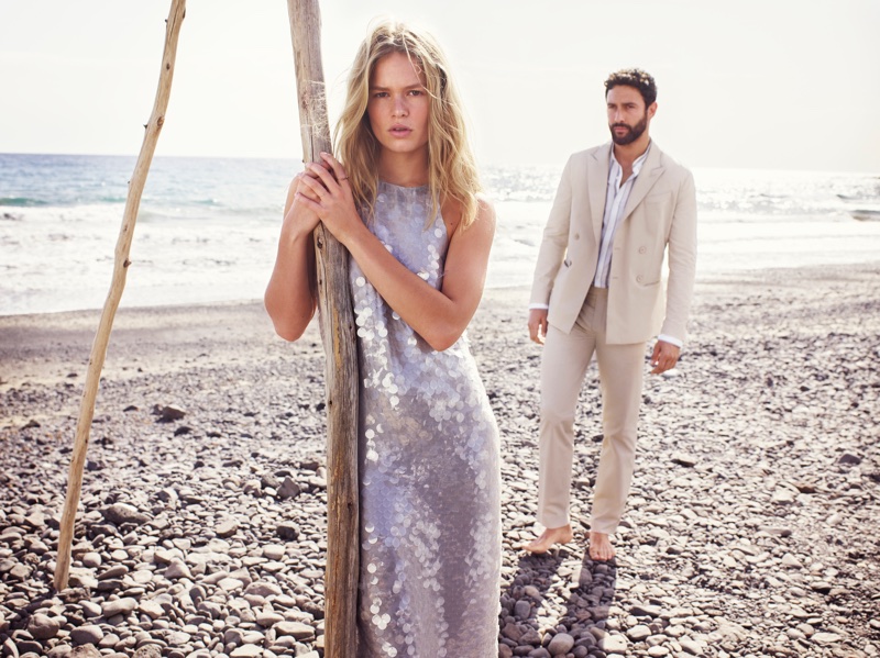 Anna Ewers and Noah Mills pose on the beach for Mango's spring-summer 2018 campaign