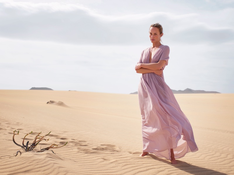 Amber Valletta poses in maxi dress for Mango's spring-summer 2018 campaign