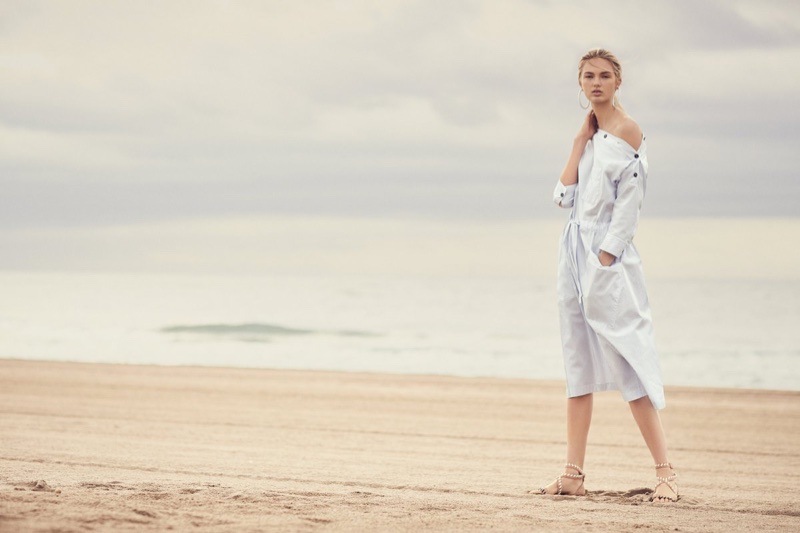 Romee Strijd poses at the beach for Hugo Boss Summer of Ease 2018 campaign
