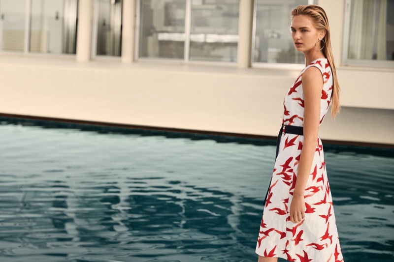 Posing poolside, Romee Strijd wears printed Hugo Boss dress