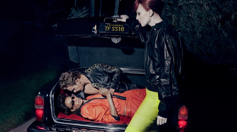 Posing in a car trunk with Adam Senn, Joan Smalls fronts Tom Ford's spring-summer 2018 campaign with Karen Elson