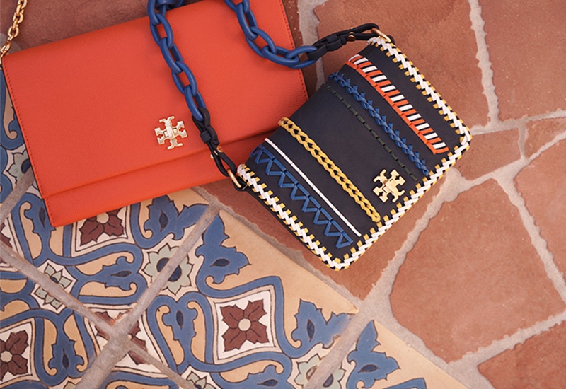 (Left) Tory Burch Kira Clutch in Poppy Orange (Right) Tory Burch Kira Whipstitch Clutch