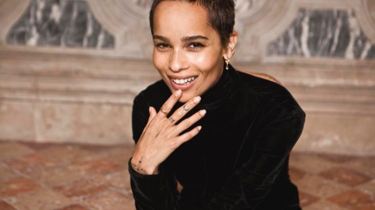 Flashing a smile, Zoe Kravitz poses in Saint Laurent dress