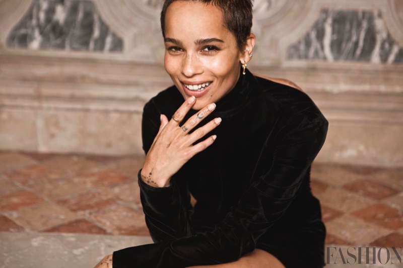 Flashing a smile, Zoe Kravitz poses in Saint Laurent dress