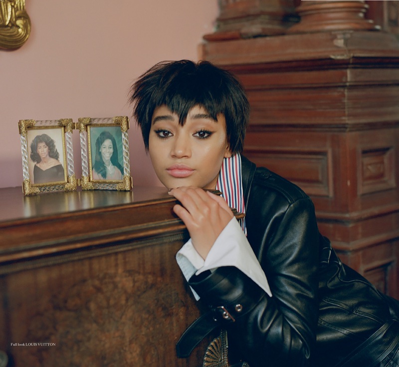 Amandla Stenberg poses in jacket and shirt from Louis Vuitton