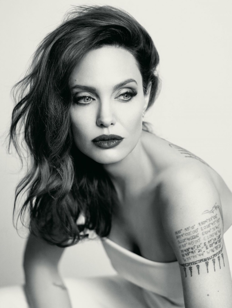 Photographed in black and white, Angelina Jolie wears her hair in glamorous waves. Photo: Mathieu Cesar