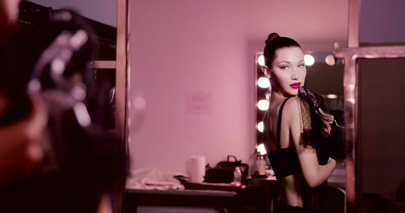 Model Bella Hadid poses behind-the-scenes for Dior Addict Lacquer Plump campaign