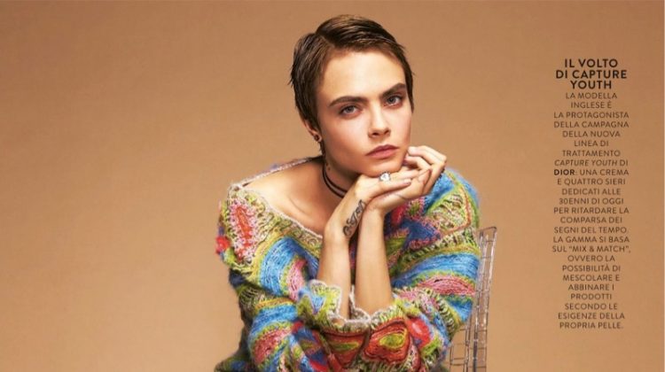 Cara Delevingne wears Dior sweater, skirt and boots