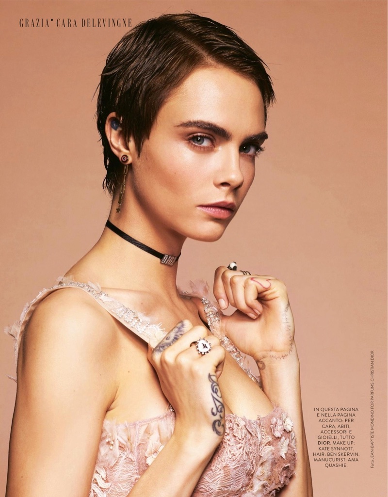 Cara Delevingne poses in Dior dress and jewelry