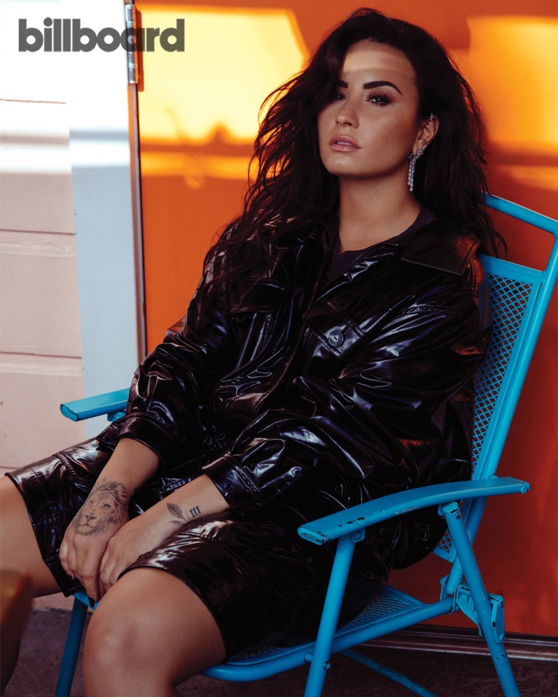 Singer Demi Lovato shows off her tattoos