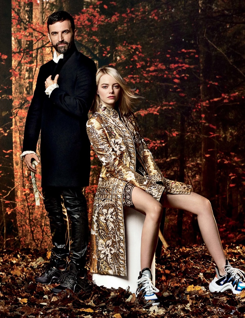 Wearing Louis Vuitton, Emma Stone poses with the brand's creative director Nicolas Ghesquière 