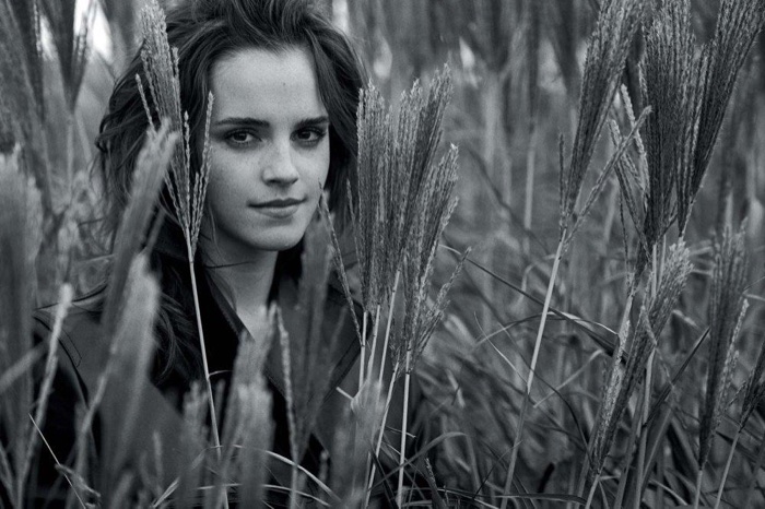 Posing outdoors, Emma Watson wears Kwaidan Editions coat