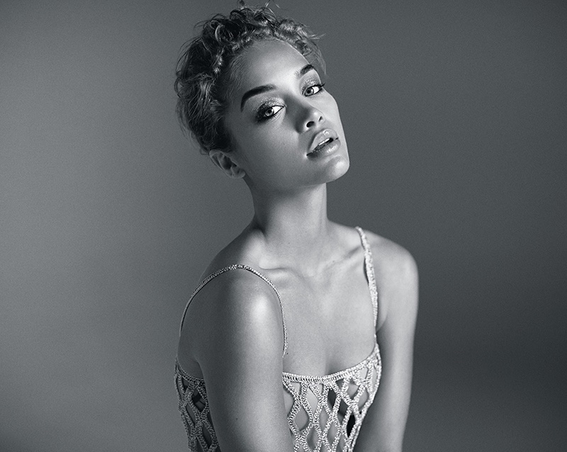 Captured in black and white, Jasmine Sanders wears Rosetta Getty mesh top