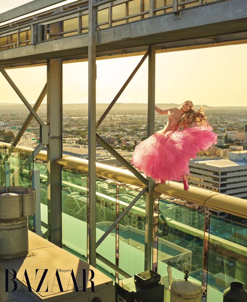 Looking pretty in pink, Jennifer Lopez wears Oscar de la Renta gown and Manolo Blahnik sandals