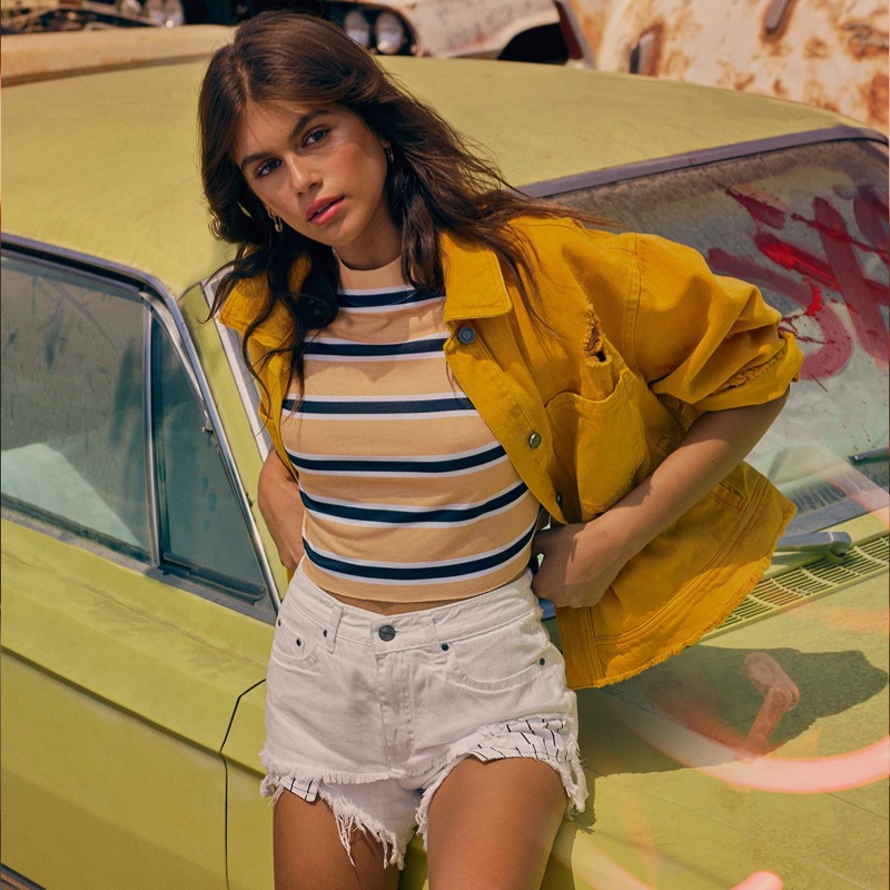 Model Kaia Gerber rocks yellow jacket, striped shirt and denim shorts in Penshoppe's spring 2018 campaign