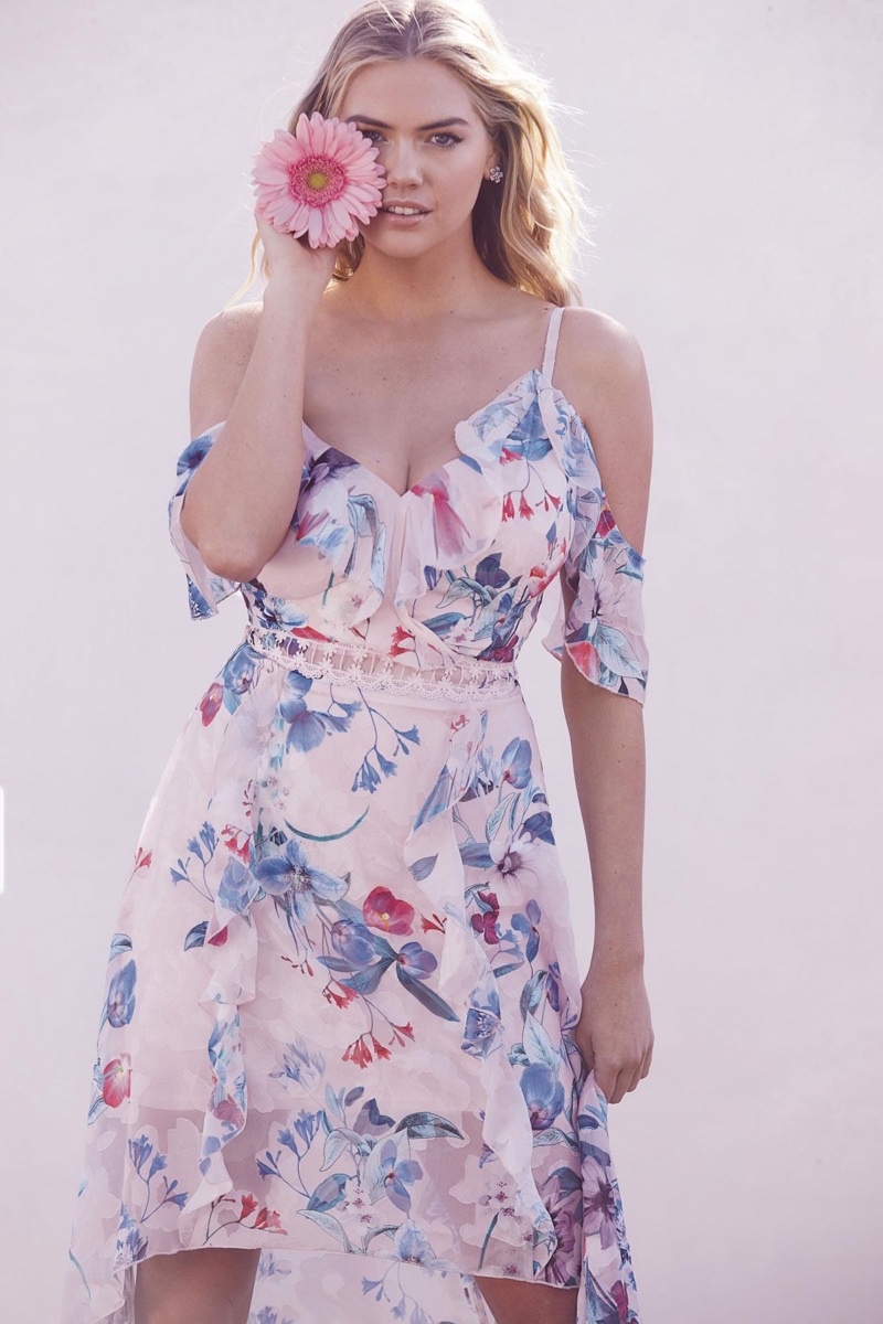 Posing in a floral print dress, Kate Upton fronts Lipsy's spring 2018 campaign