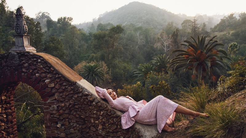 Lisa Bonet poses in Loewe top and skirt with ATP sandals