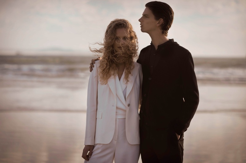 Posing on the beach, Frederikke Sofie and Erik van Gils front Massimo Dutti lookbook