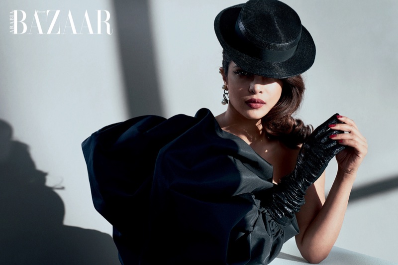 Actress Priyanka Chopra wears Saint Laurent dress, hat and earrings with LaCrasia gloves