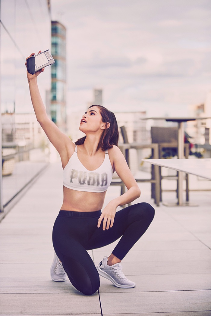 Singer Selena Gomez snaps a picture for PUMA Ignite Flash sneaker campaign