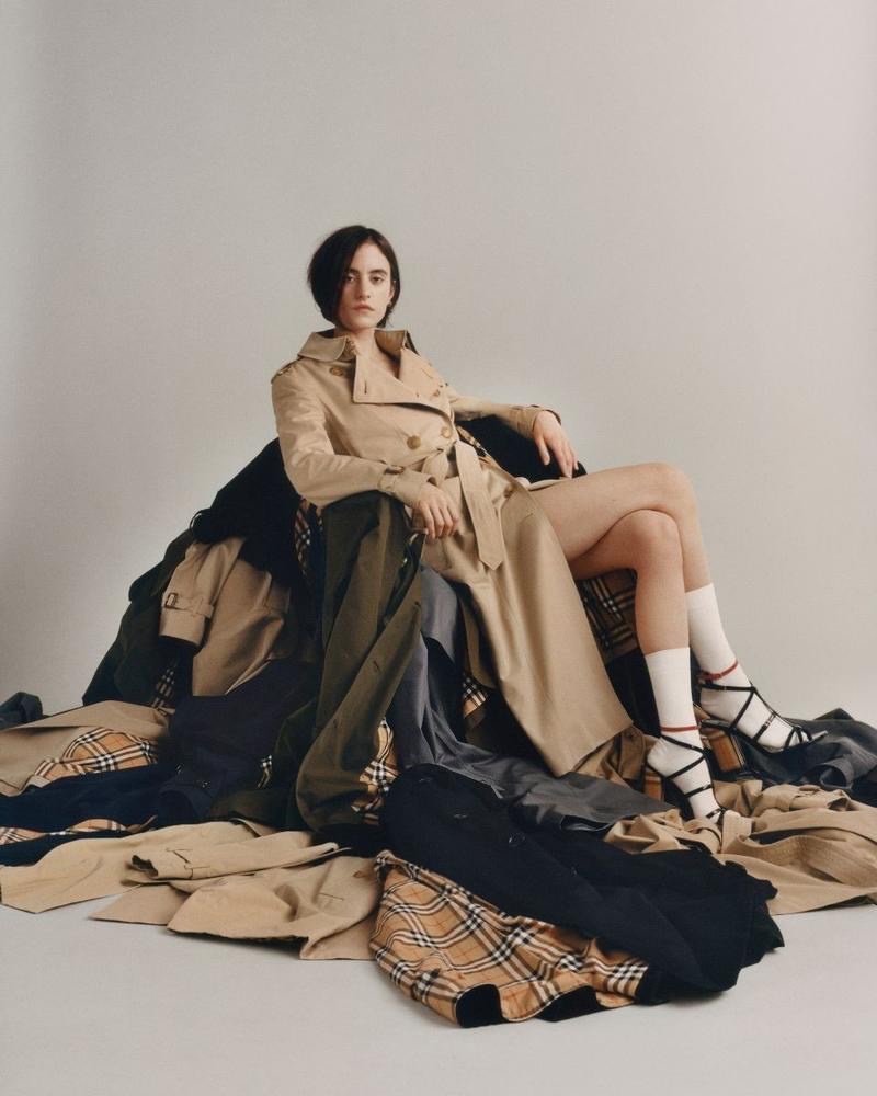 Chloé Nardin poses in Burberry The Westminster Trench Coat in Honey $2,090 and Vintage Check and Patent Leather Sandals $580