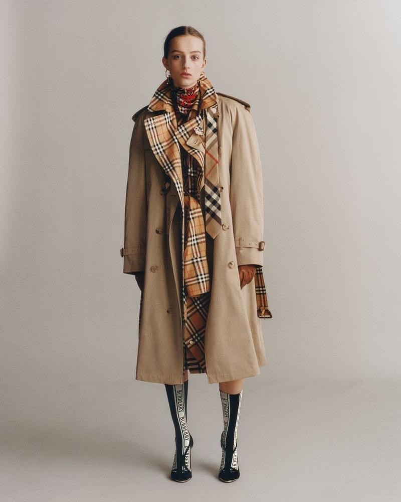 Hebe Flury poses in Burberry The Westminster Coat $2,090 and Graffiti Print Silk Scarf $450