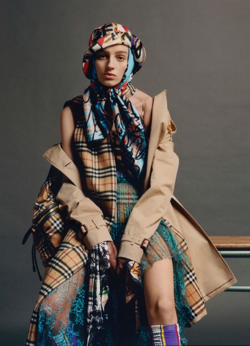 Hebe Flury poses in Burberry The Kensington Coat $1,990 and Scribble Check Silk Scarves $420