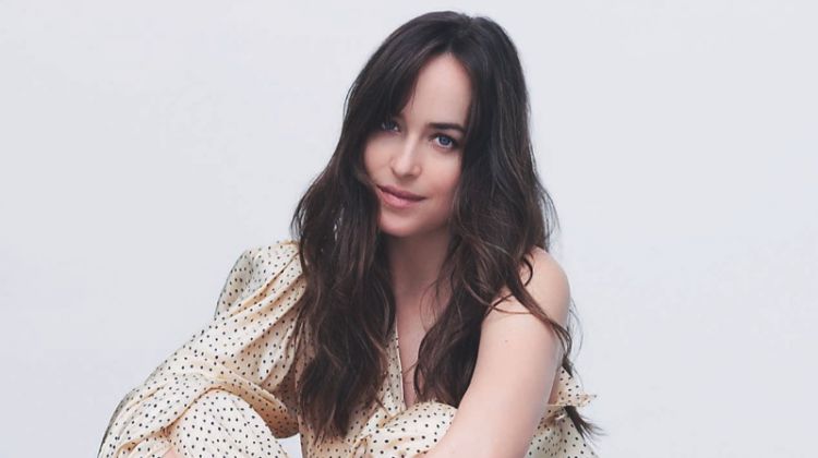 Dakota Johnson poses in Gucci top and pants