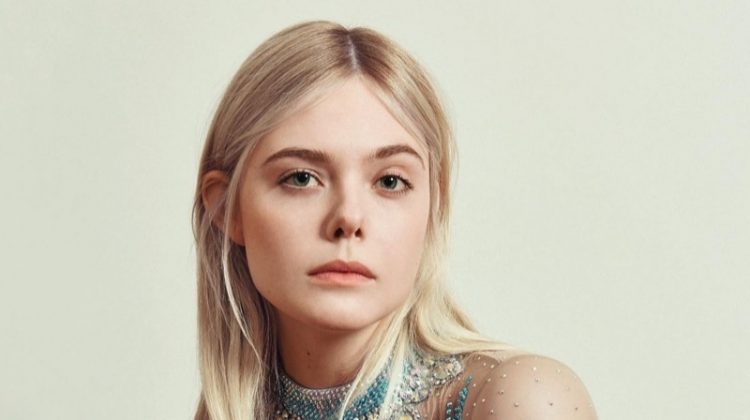 Actress Elle Fanning wears embellished bodysuit and lace dress from Gucci