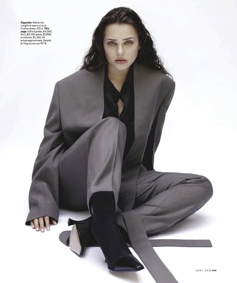 Suiting up, Katherine Langford poses in a Celine pantsuit and heels