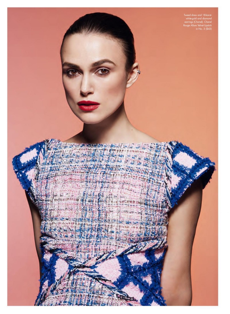 Actress Keira Knightley poses in Chanel tweed dress and earrings