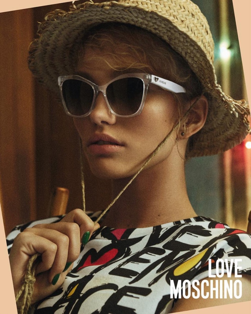 Kim van der Laan wears sunglasses in Love Moschino's spring-summer 2018 campaign