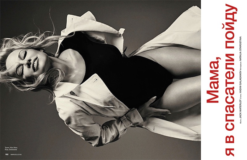 Photographed in black and white, Pamela Anderson wears Max Mara coat and Intimissimi bodysuit
