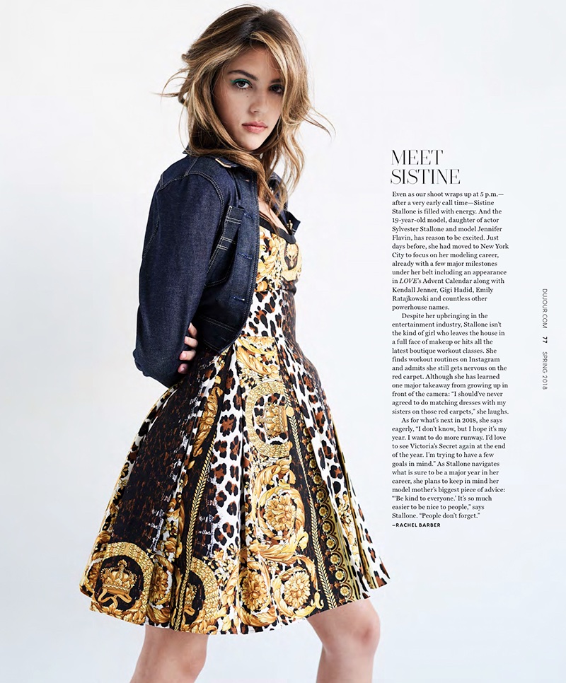 Sistine Stallone poses in Versace jacket and dress