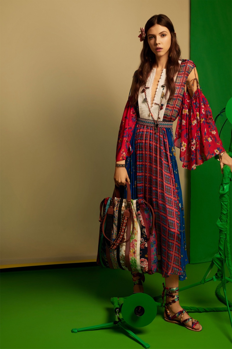 Léa Julian poses in Zara contrast printed dress, scarf sandals and printed bag