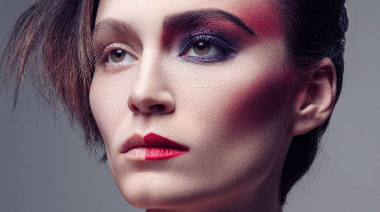 Alex Boldea wears makeup on half of her face. Photo: Jeff Tse