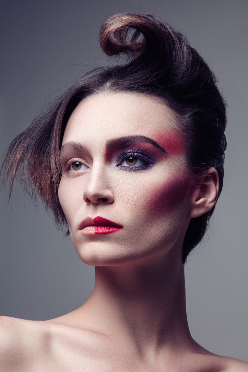 Alex Boldea wears a half-faced makeup look. Photo: Jeff Tse