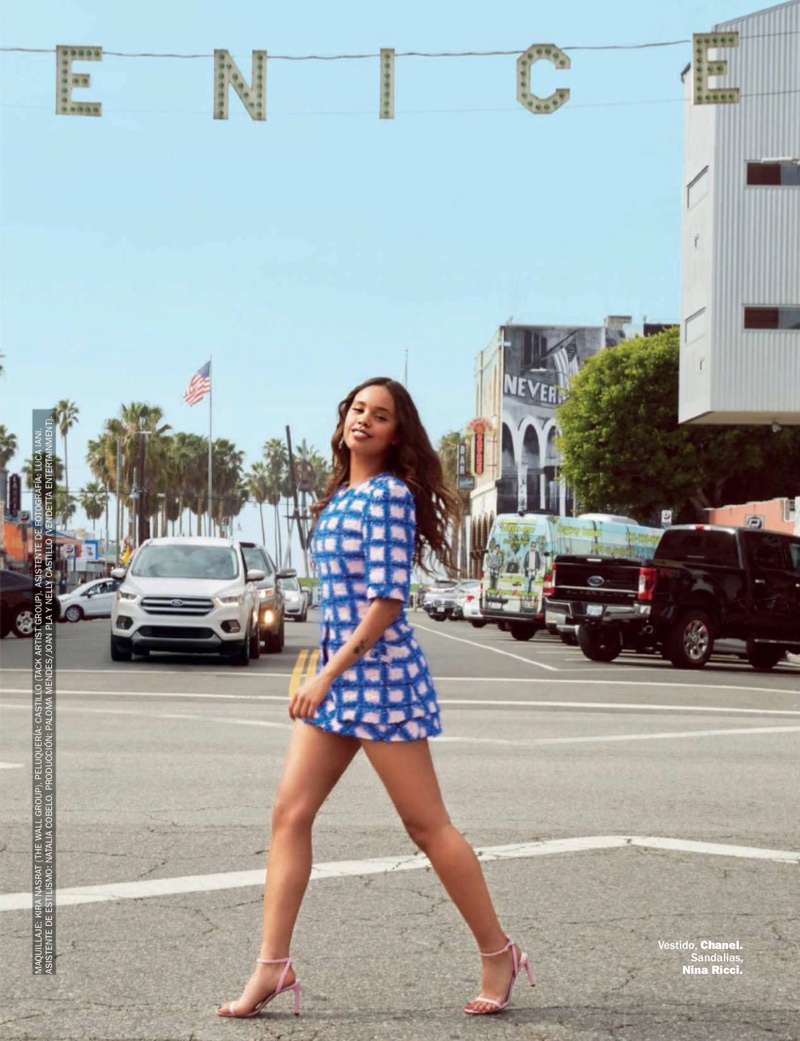 Posing in Venice Beach, California, Alisha Boe wears Chanel dress and Nina Ricci sandals