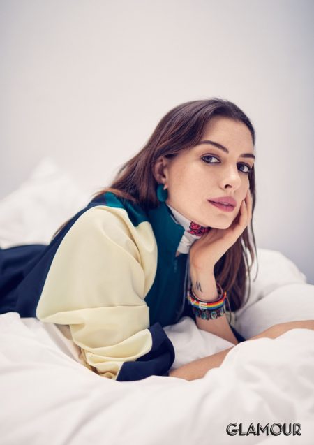 Anne Hathaway Lounges in Bed for Glamour Actress Anne Hathaway poses in Lacoste dress, Rockins scarf and Celine earring