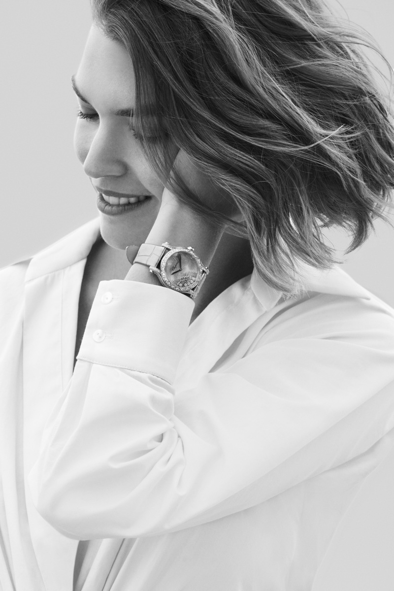 Flashing a smile, Arizona Muse appears in Chopard Happy Diamonds jewelry campaign