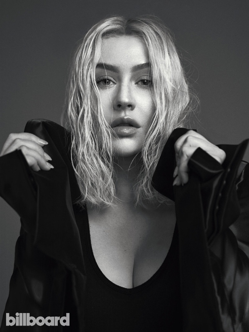 Photographed in black and white, Christina Aguilera wears the wet hair look