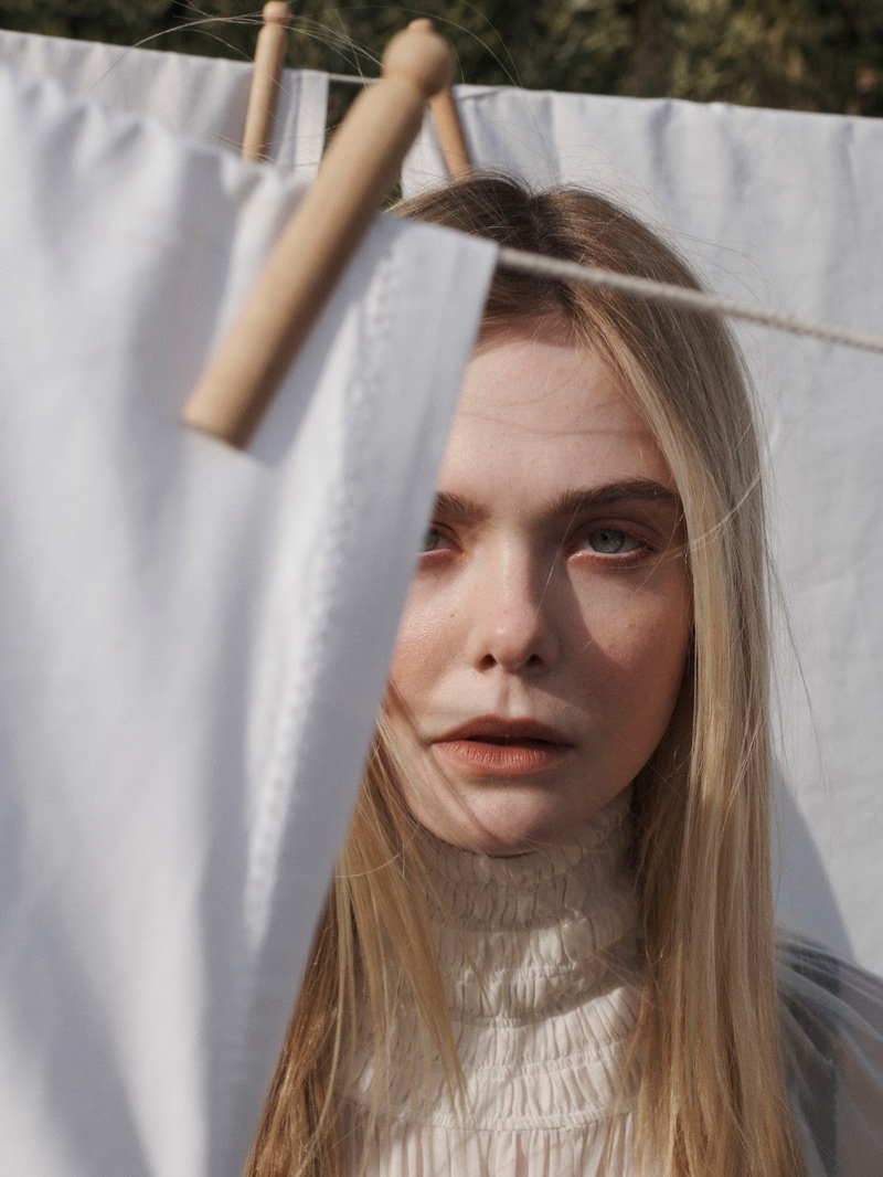 Ready for her closeup, Elle Fanning wears a Jil Sander dress