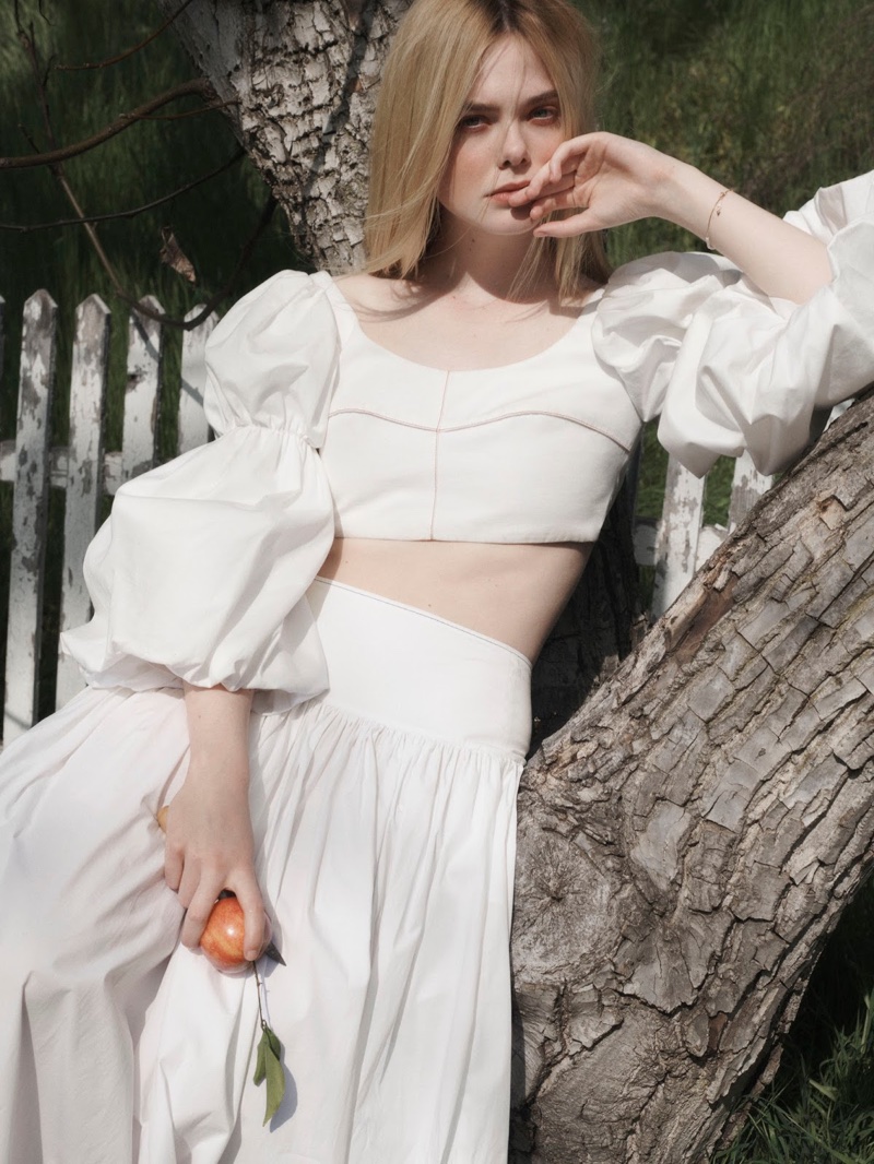 Elle Fanning poses in Ellery top and Elizabeth and James maxi skirt